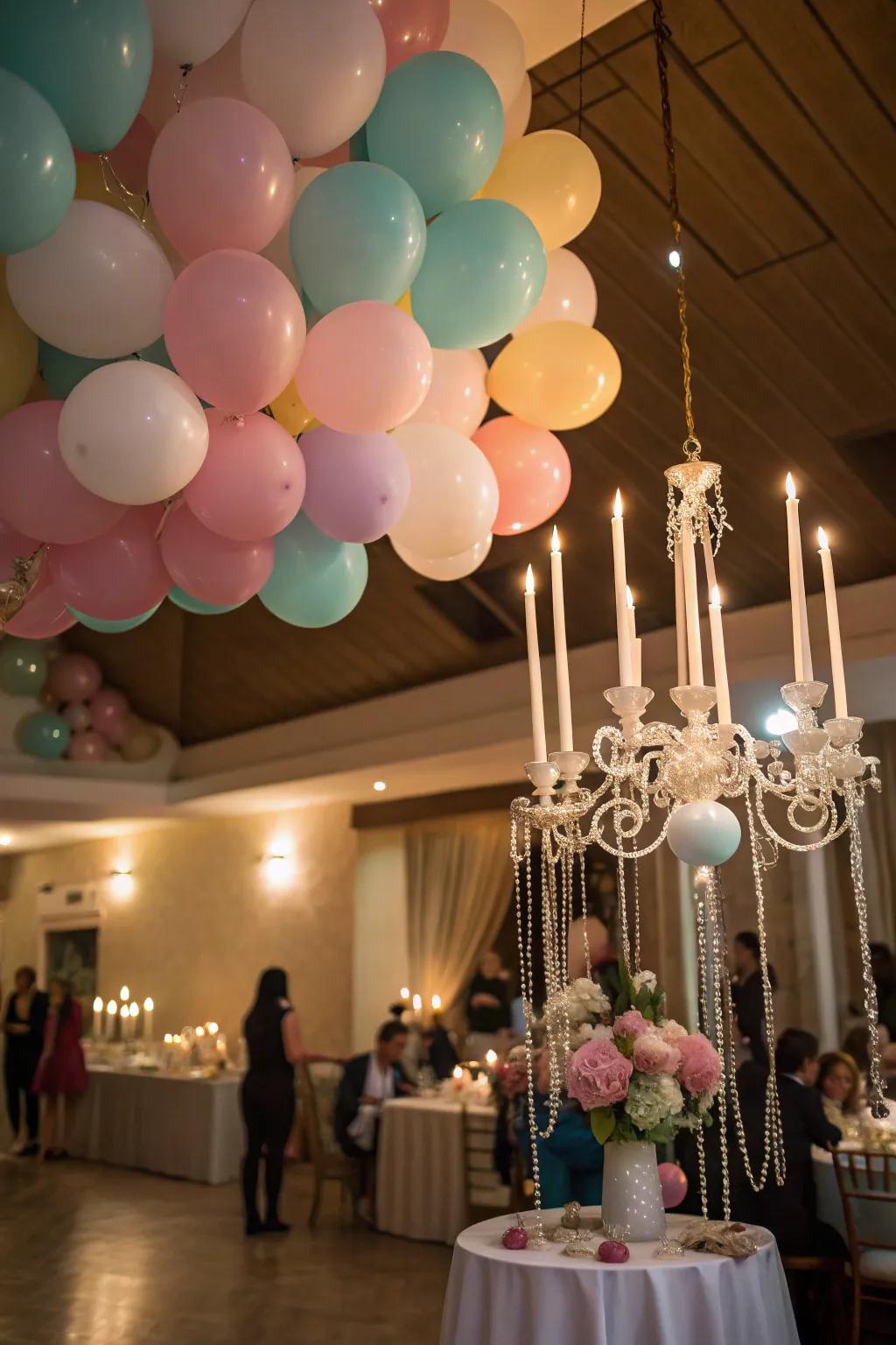 Balloon clusters with hanging candles for a chandelier effect.