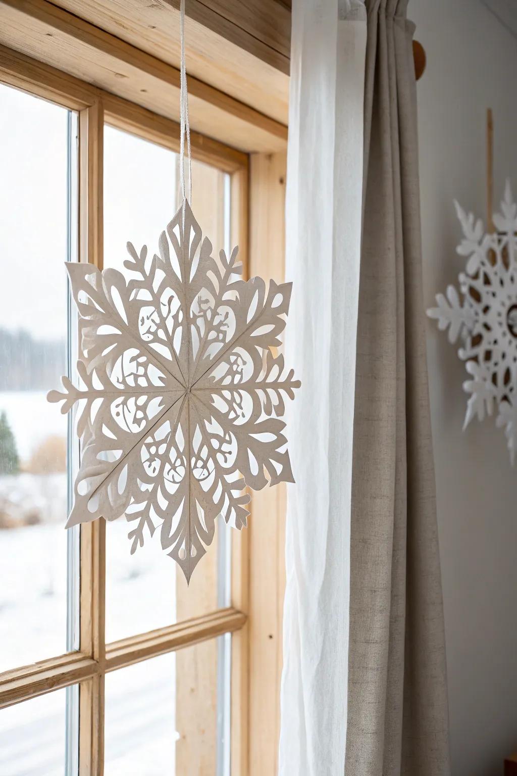 Capture the magic of winter with these exquisite paper snowflakes, perfect for adding a touch of handcrafted elegance to your home.