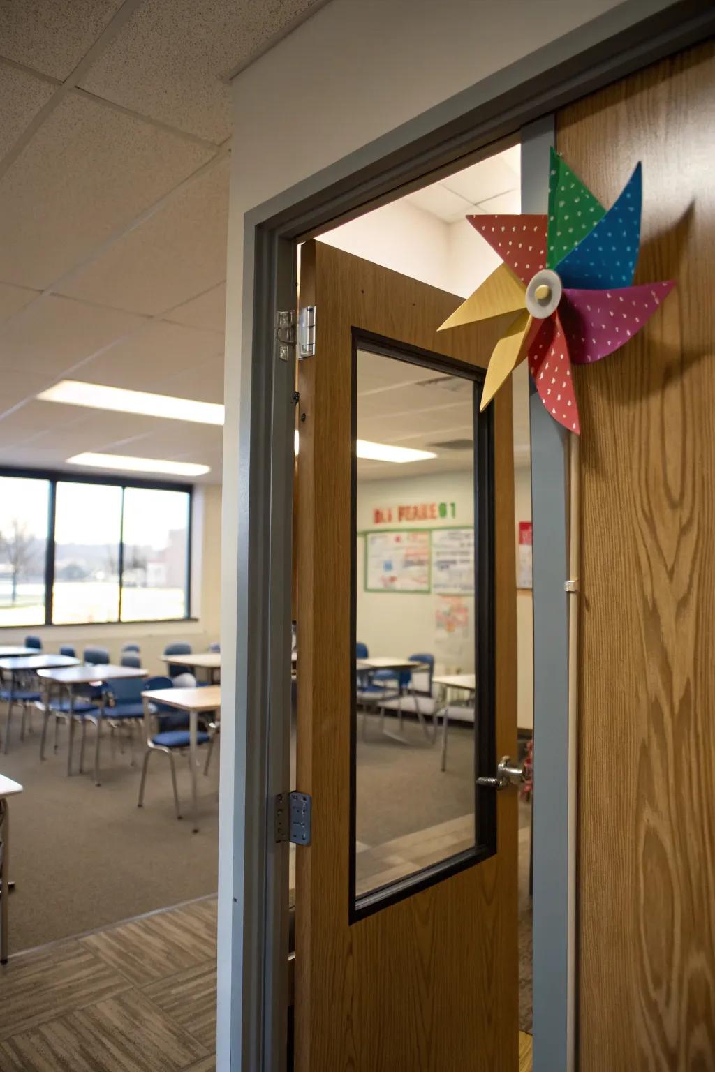 A windmill adds movement and a traditional touch to the farm theme.