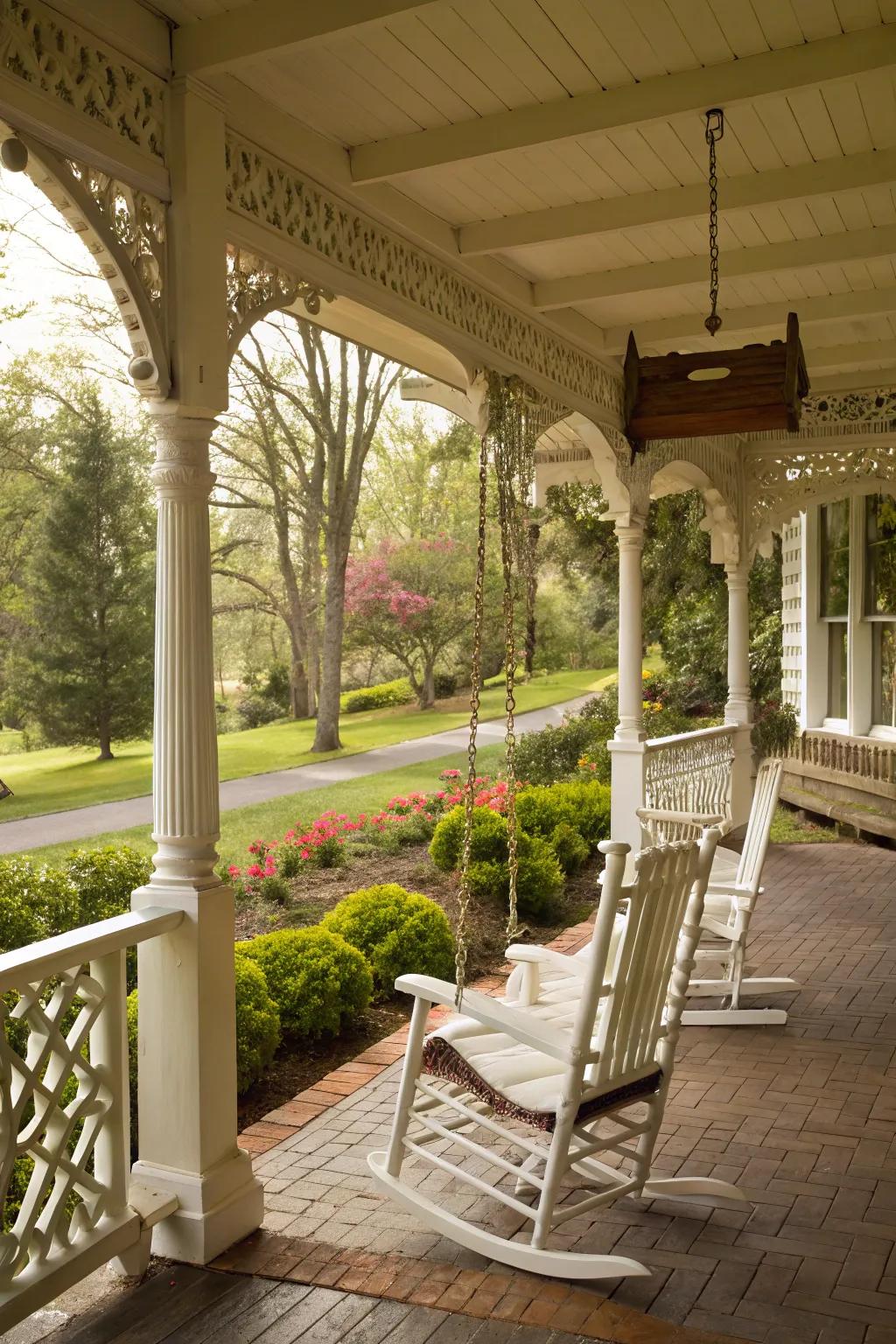 White rocking chairs and a swing add nostalgic comfort.