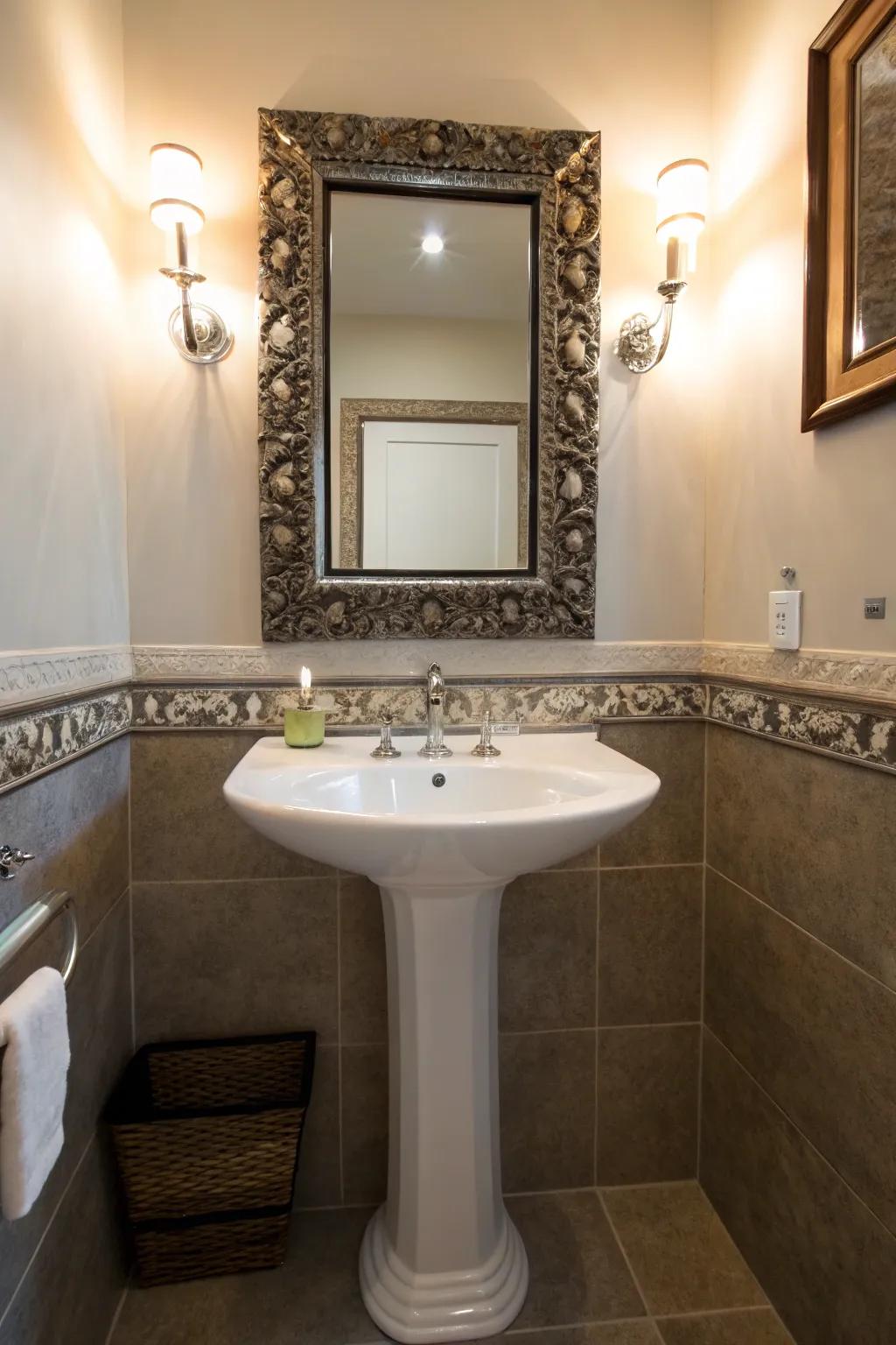Elegant mirror enhancing the pedestal sink setup.