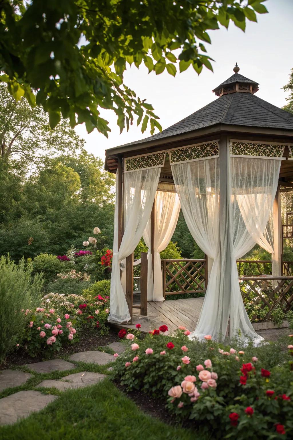 Sheer curtains bring elegance and privacy to this gazebo.