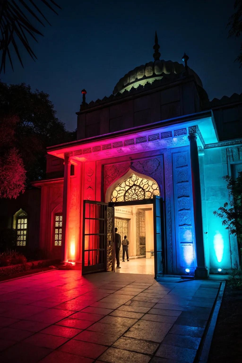 Colored lighting adding mood and drama to the entrance.