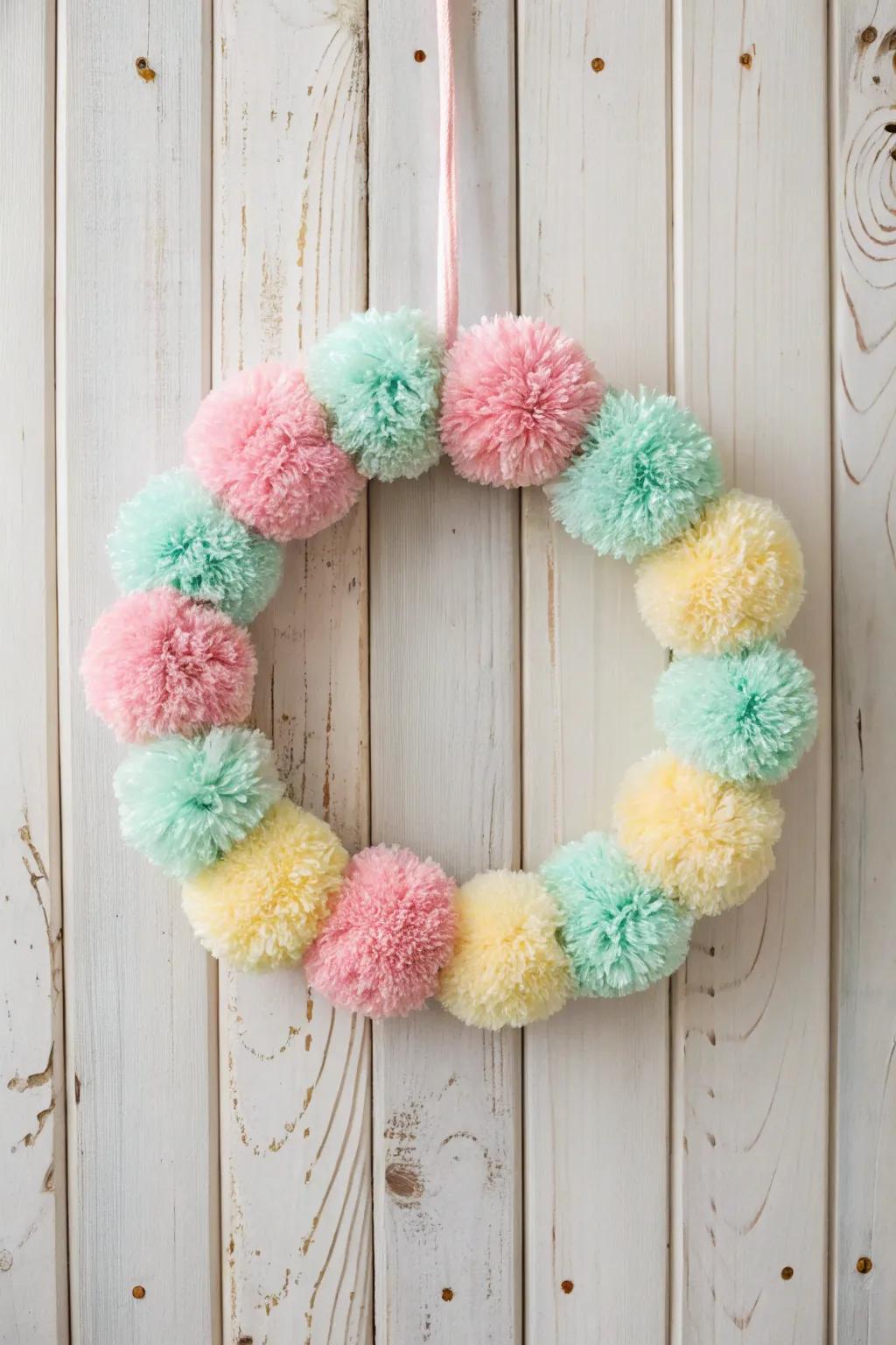 Add a splash of joy to your decor with this delightful pom pom wreath, where Scandinavian minimalism meets playful Boho charm.