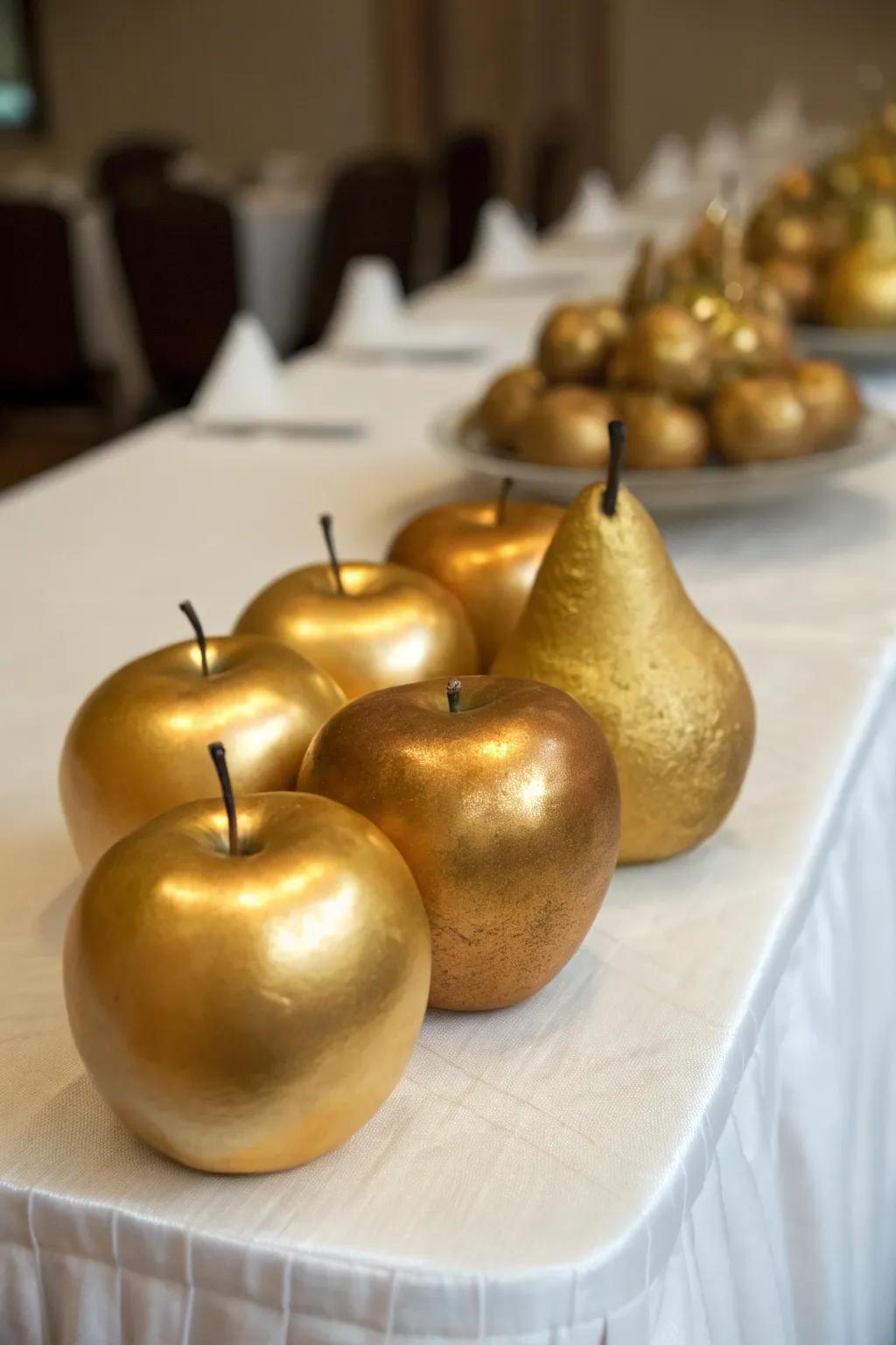 A unique centerpiece with gold-painted fruits.