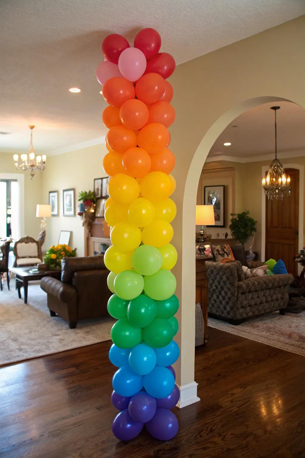 Celebrate with a rainbow balloon column.