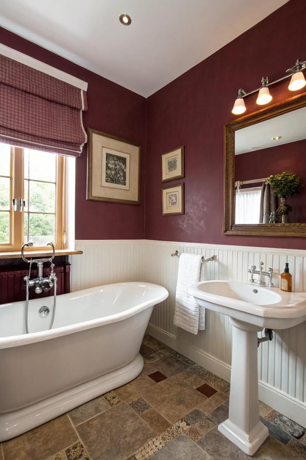 White fixtures paired with maroon walls create a modern and elegant look.
