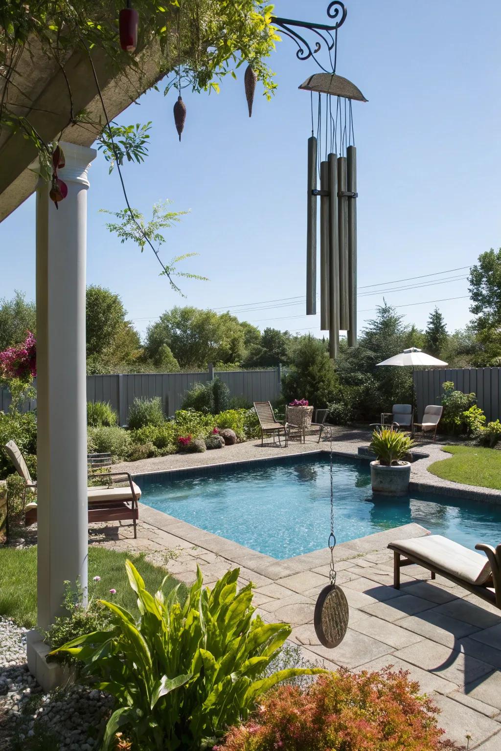 Subtle sound elements like wind chimes bring peace to this pool area.
