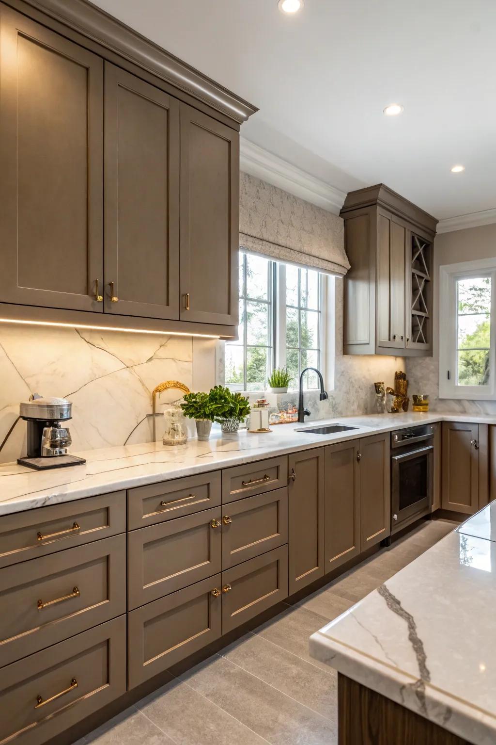 Marble countertops add elegance to dark beige kitchens.