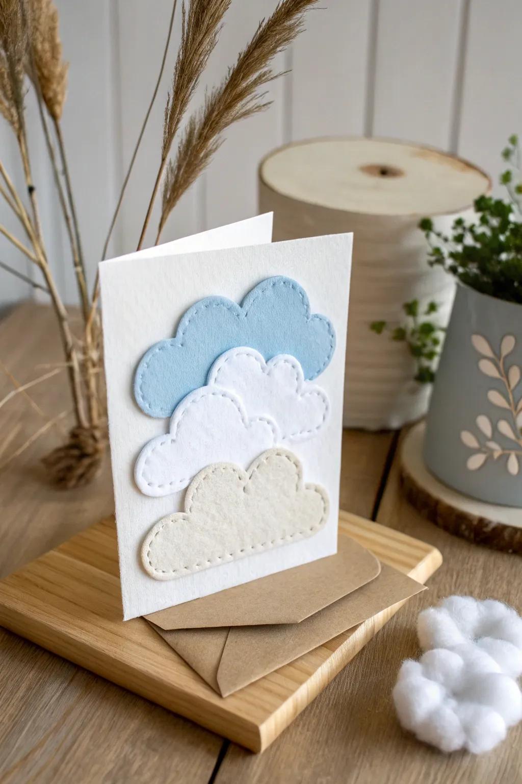 Embrace serenity with this handcrafted cloud-themed baby card, where simplicity and natural beauty meet.