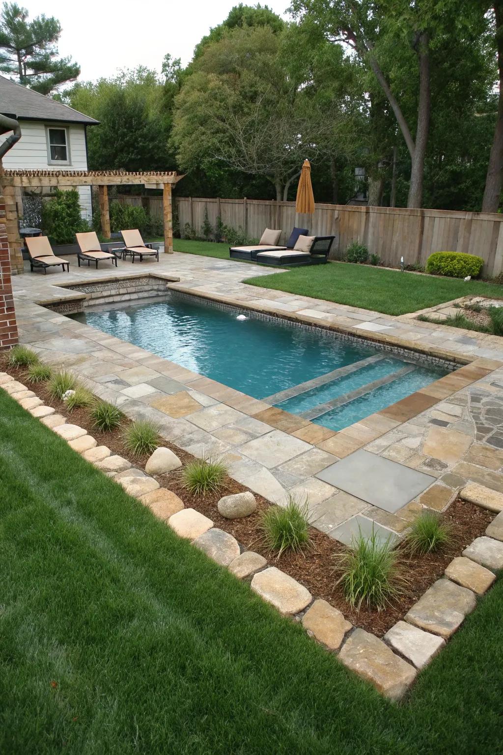 Mixed materials create a visually dynamic and unique pool surround.