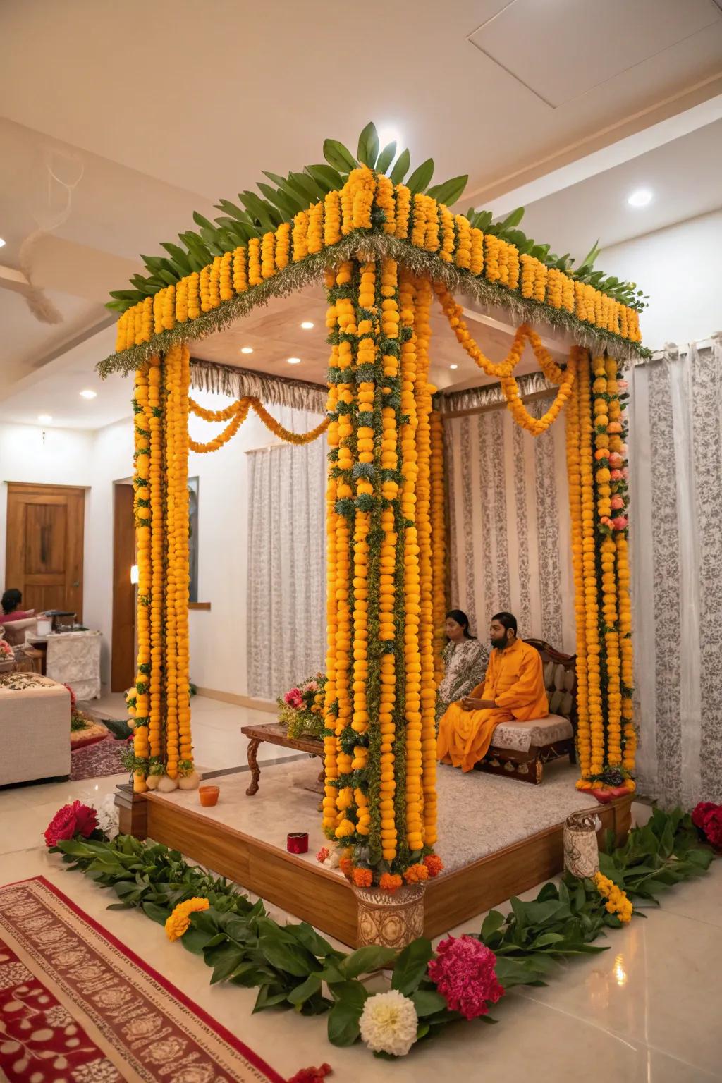 Bright marigold garlands and floral canopies enhance this Ganpati mandap.