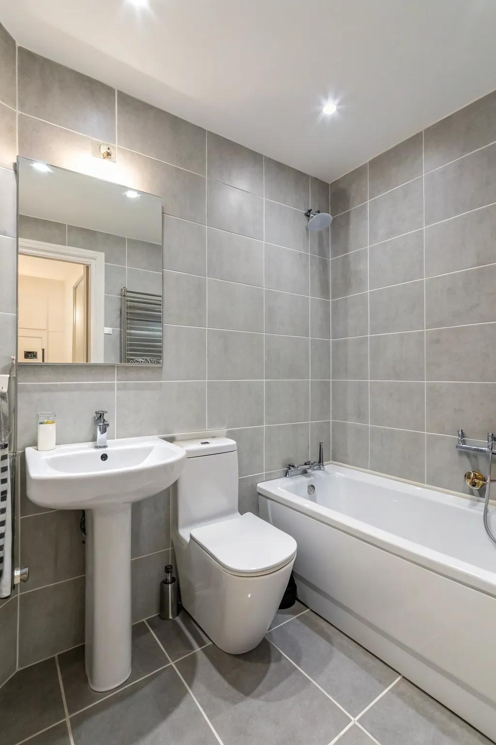 Light gray and white create a bright, airy space.