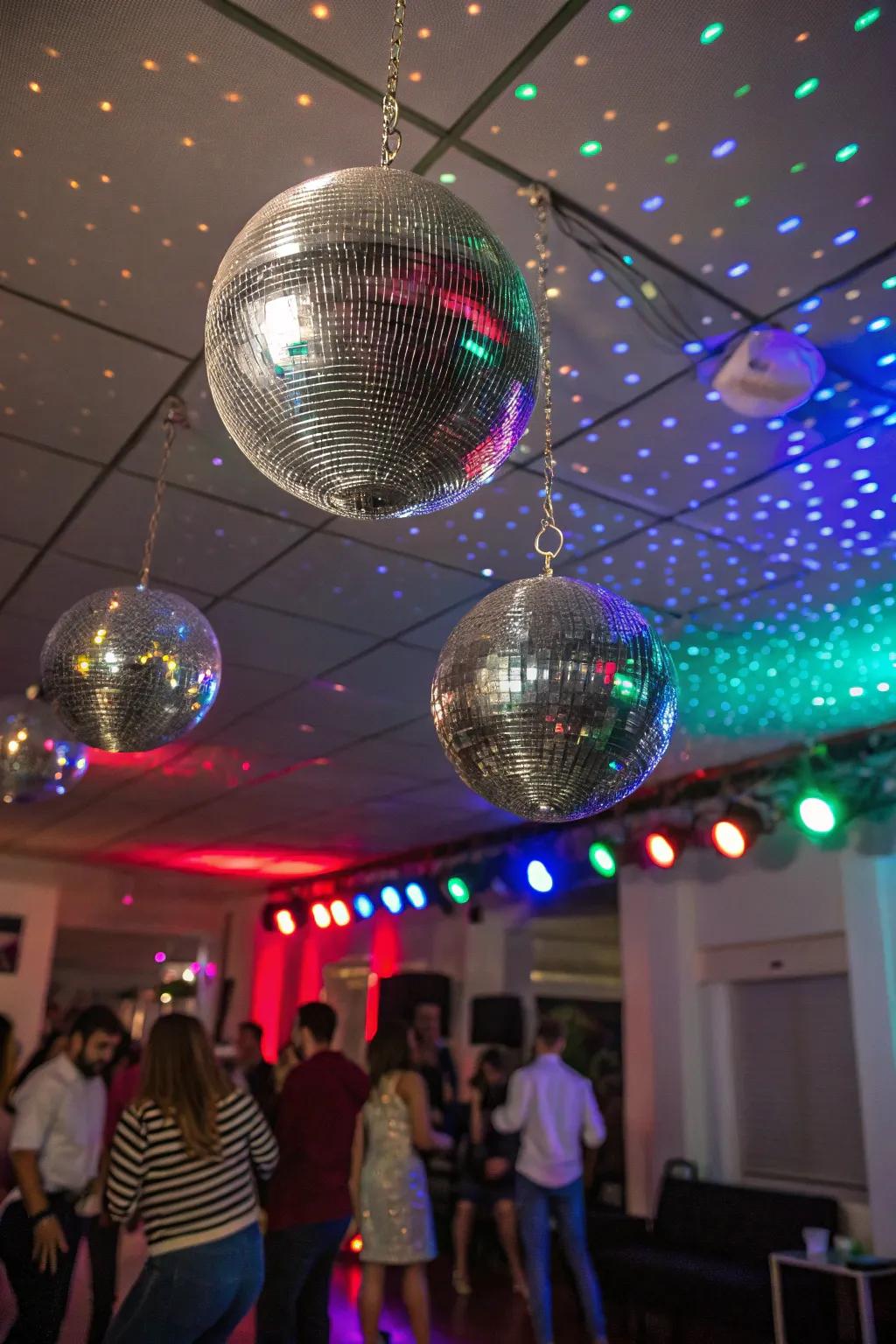 Disco balls create a sparkling and festive atmosphere.