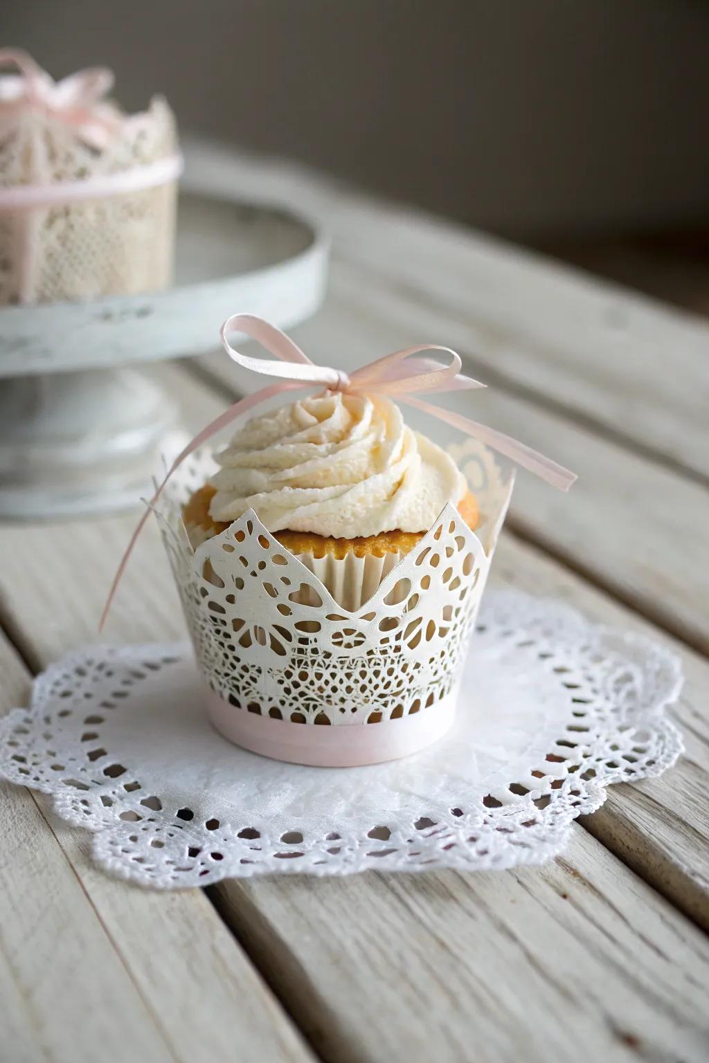 Elevate your cupcake presentation with elegant lace doily wraps for a touch of effortless chic.