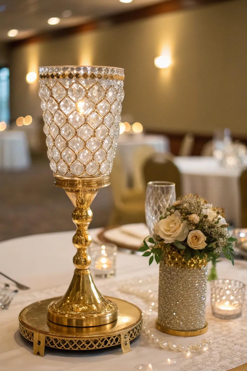 A glamorous centerpiece with crystal and gold elements.